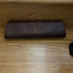 Naldo brown leather clutch